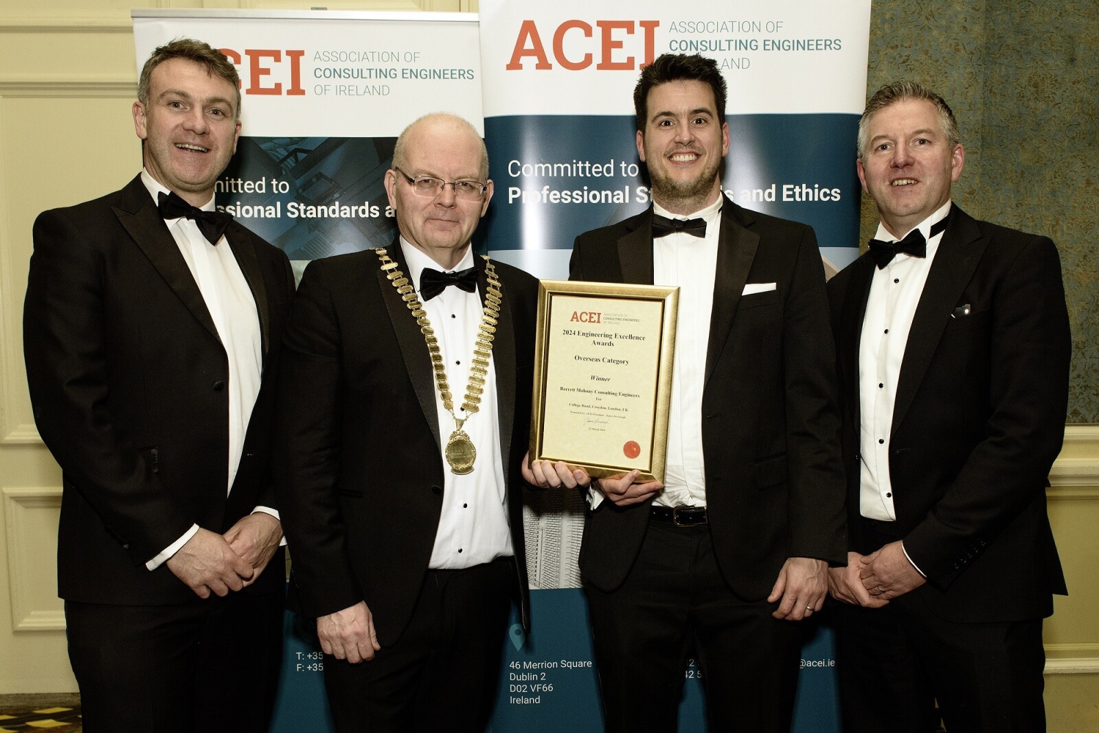 ACEI Design Excellence Awards 2024.  Pictured: L-R Dave Hyland of MJH Structural Engineers, ACEI President James Kavanagh, Shane Linehan & Ciaran Kennedy of Barrett Mahony Consulting Engineers receiving the award for College Road, Croydon.